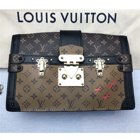 louis vuitton small clutch strap|authentic louis vuitton clutch.